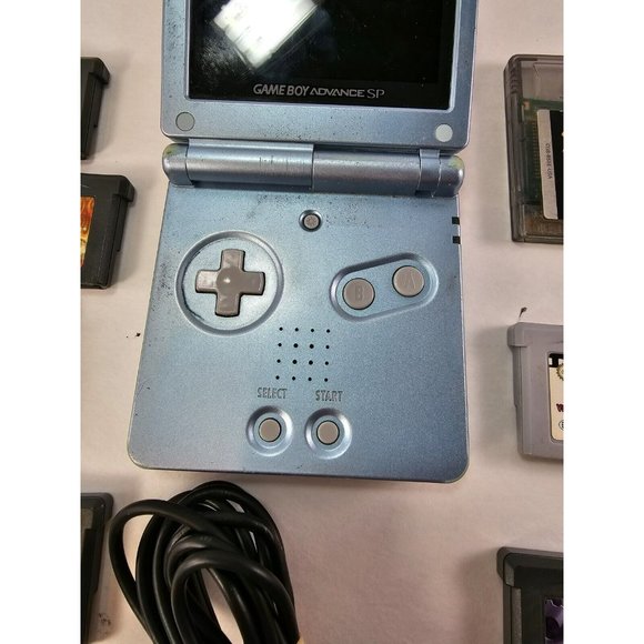 Nintendo Game Boy Advance SP Pearl Blue Bundle W/ 7 Games & Charger - Picture 5 of 10